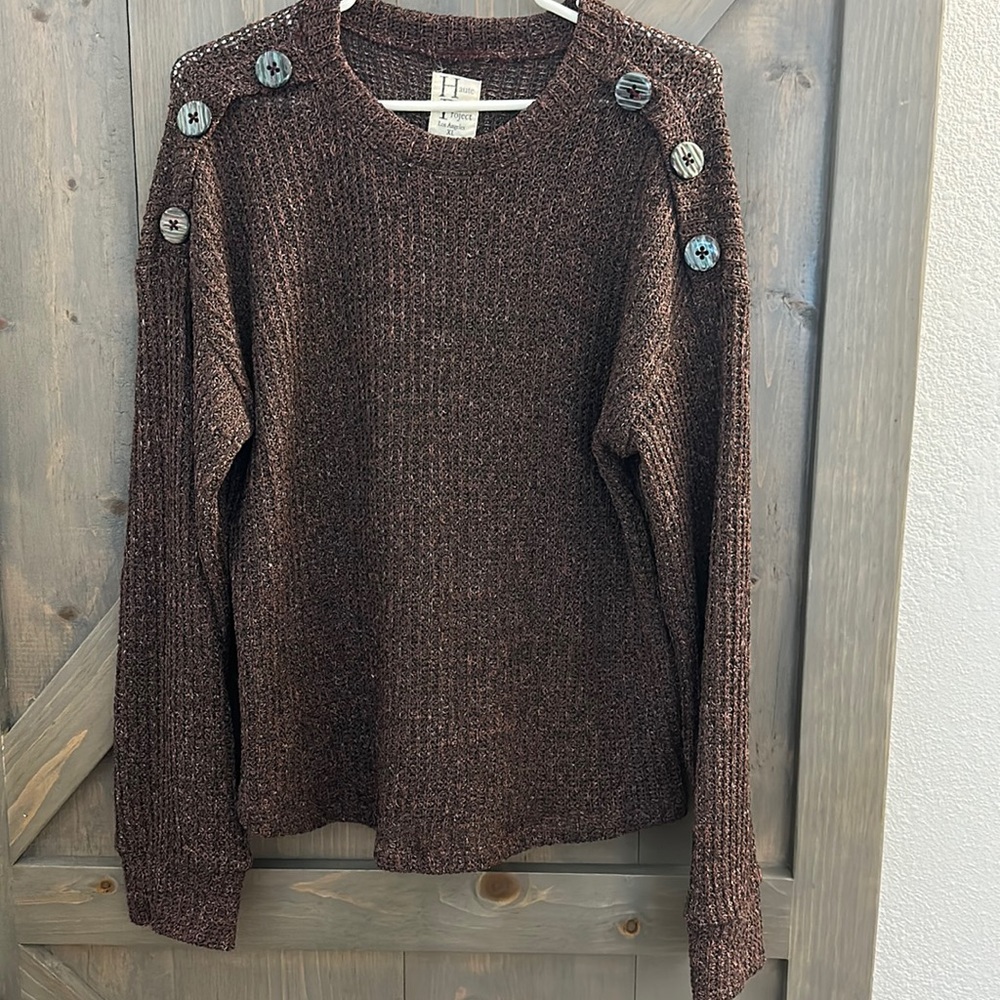 Purple crochet sweater top.